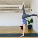 the basics of yoga how to perform a hollow handstand 1