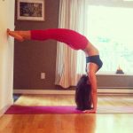 the basics of yoga how to perform a hollow handstand 4