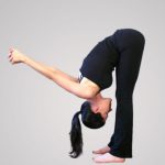 the art and benefits of dandayamana dhanurasana yoga pose 5