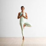 the incredible benefits of the standing bow yoga pose 3