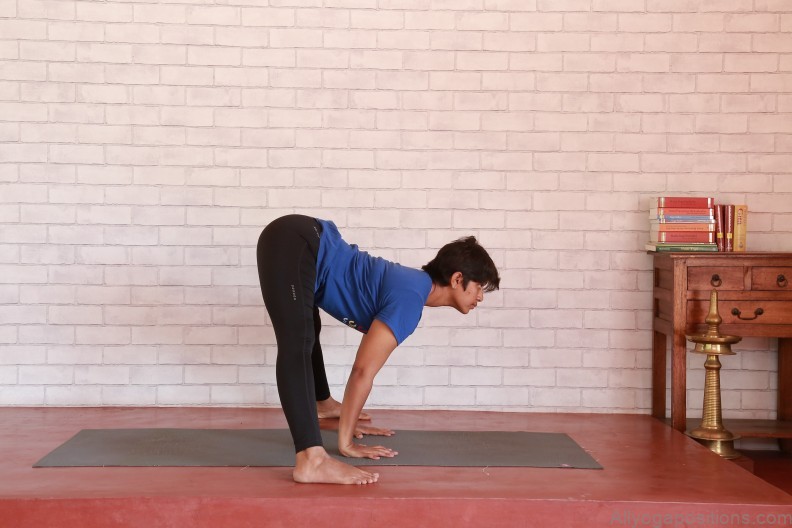the power and elegance of the wide legged forward bend ii yoga pose 3