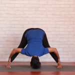 the power and elegance of the wide legged forward bend ii yoga pose 4